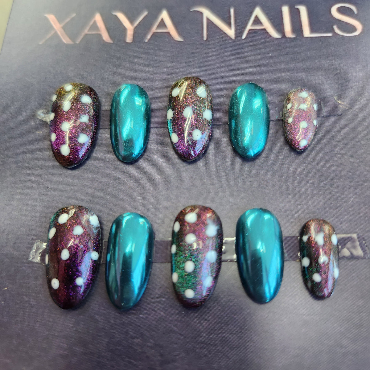Cosmic Dots gel press-on nails showing teal chrome and galaxy multichrome with white dot art