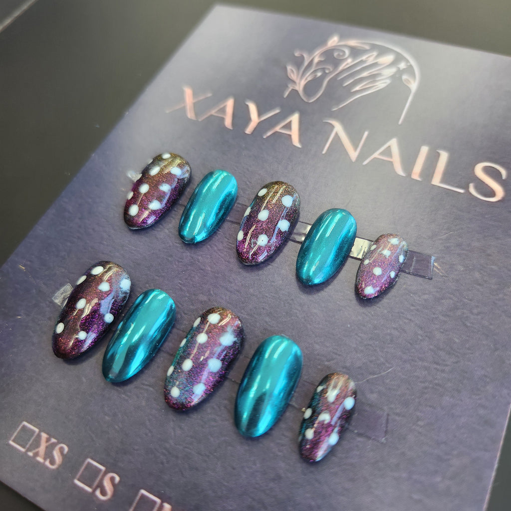 Cosmic Dots handmade gel press-on nails on Xaya Nails display card